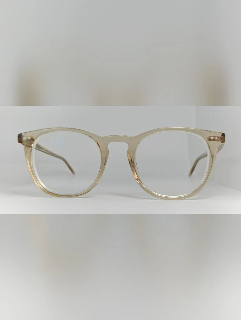 Ona. RFLKT. Clear Beige Round Frame Glasses.